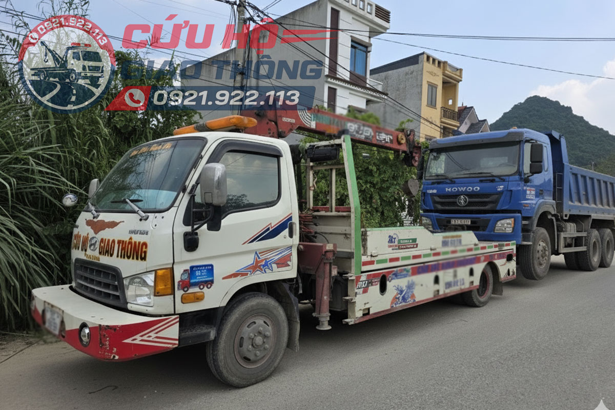 Cứu hộ kéo xe ben về garage sửa chữa